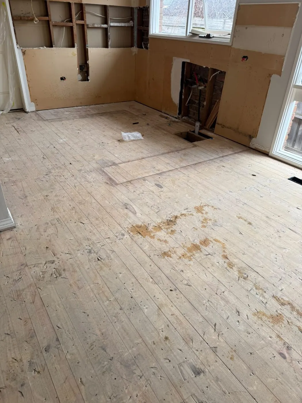 Timber subfloor exposed and prepared for new tiles